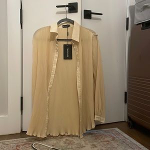 TAG STILL ON PPL SHIRT